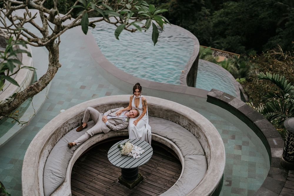 Aerial view of a circular stone patio surrounded by tropical landscaping.