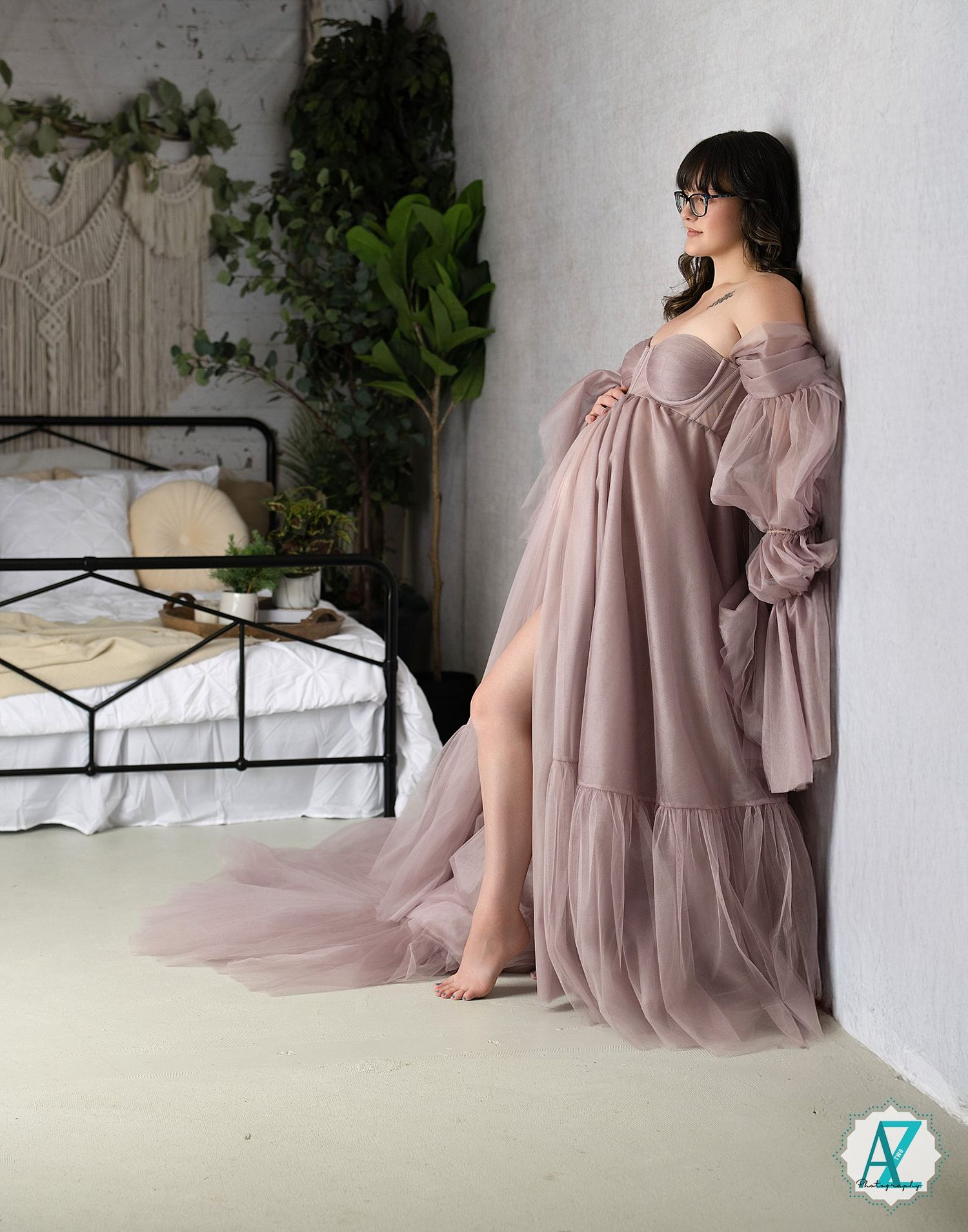 A collection of images featuring a flowing mauve dress against a white wall with macrame and plant decor.