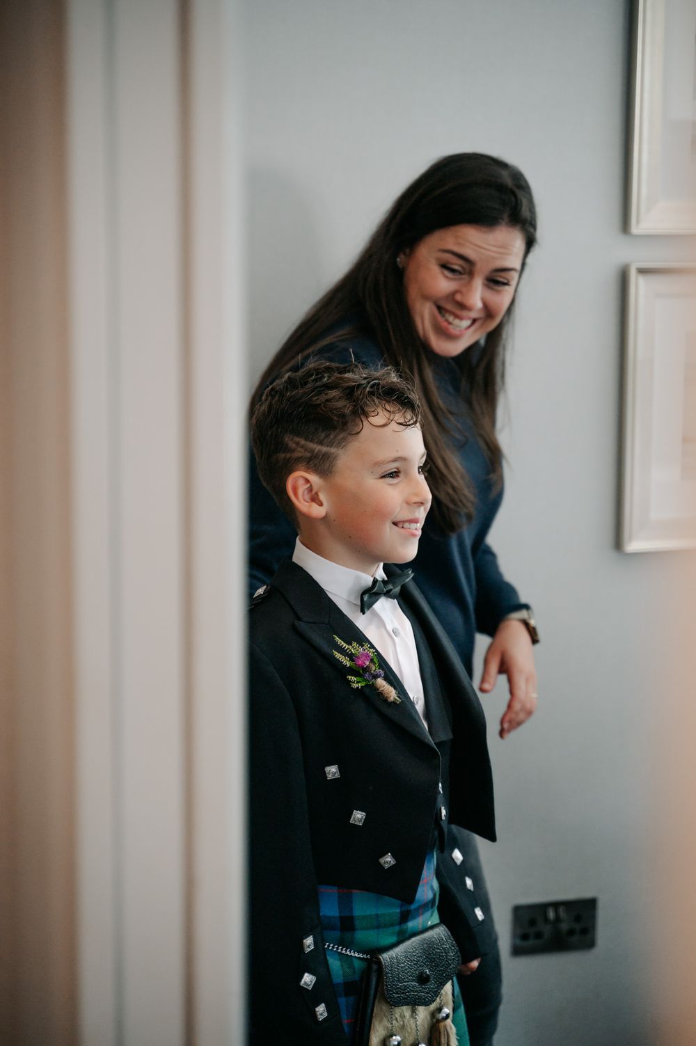 Joyful pre-wedding moments captured in a well-lit room.