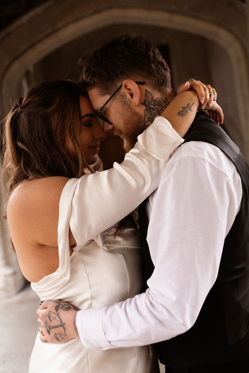 intimate moment between bride and groom after elopement session in christchurch