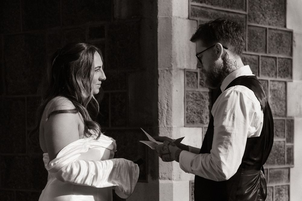 couple reading their vows to each other in christchurch