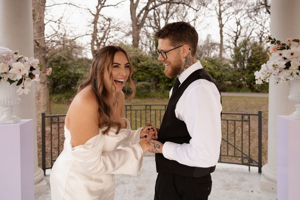 bride laughing during relaxed elopement photography session after getting married