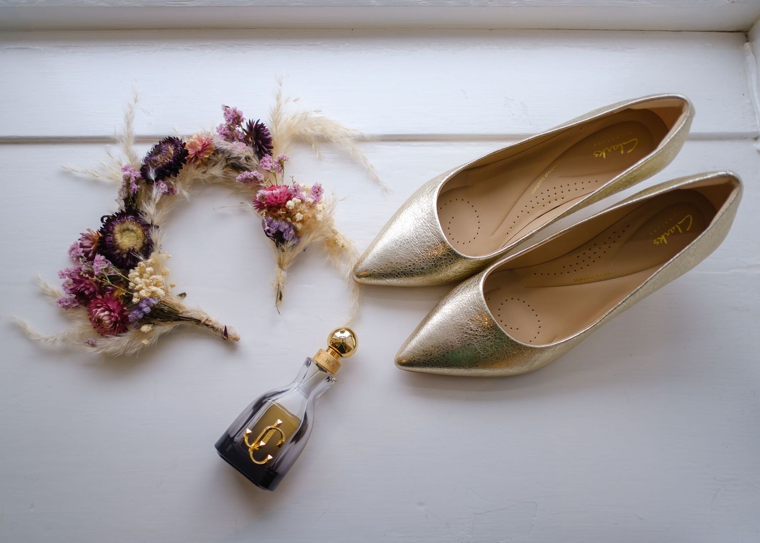 Beautiful, rustic, floral crown with dried flowers, perfume and shoes