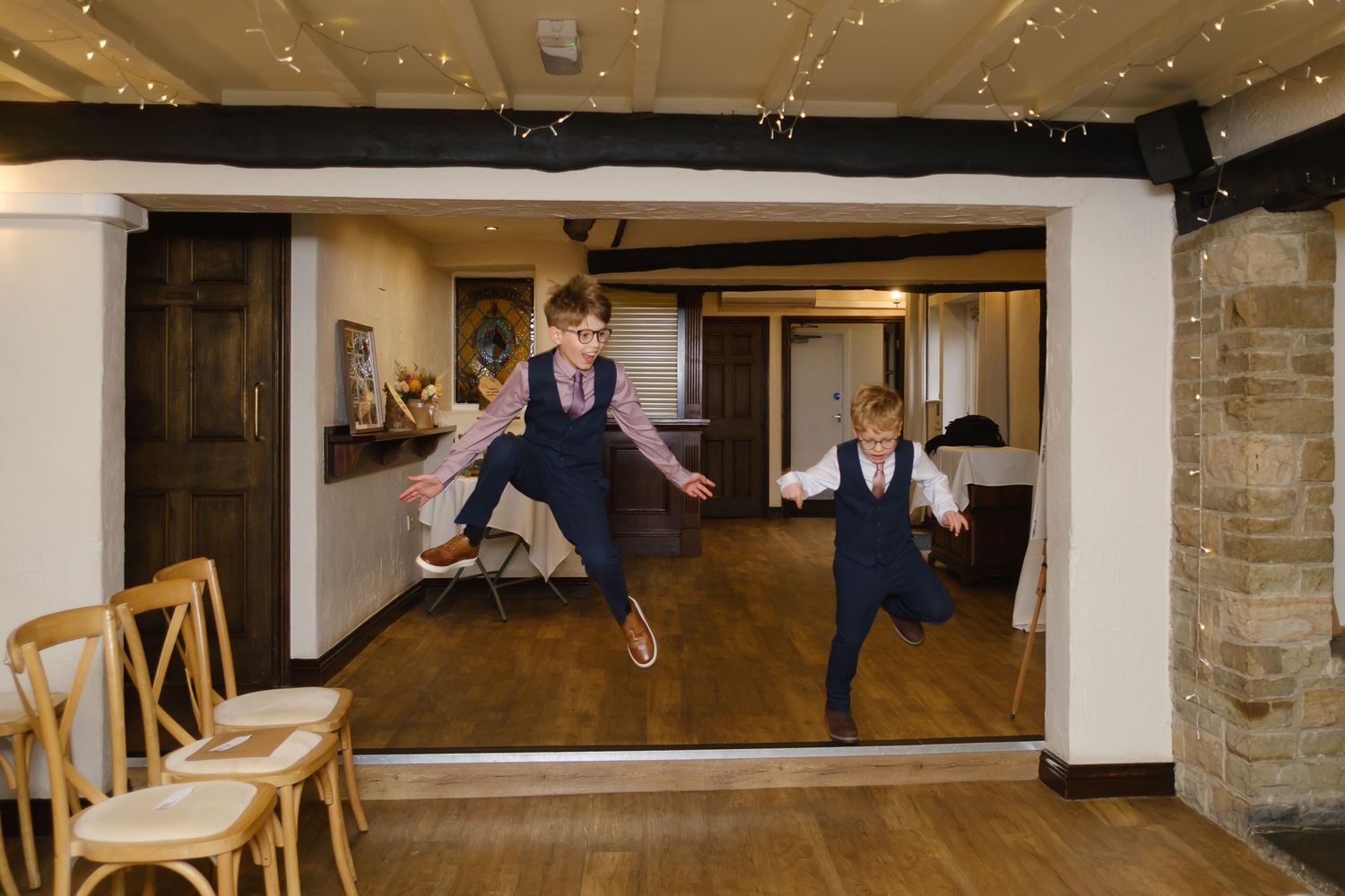 Two boys having fun on their mum's wedding day