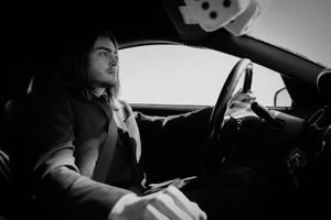 Black and white photo sequence showing someone sitting in a car interior.