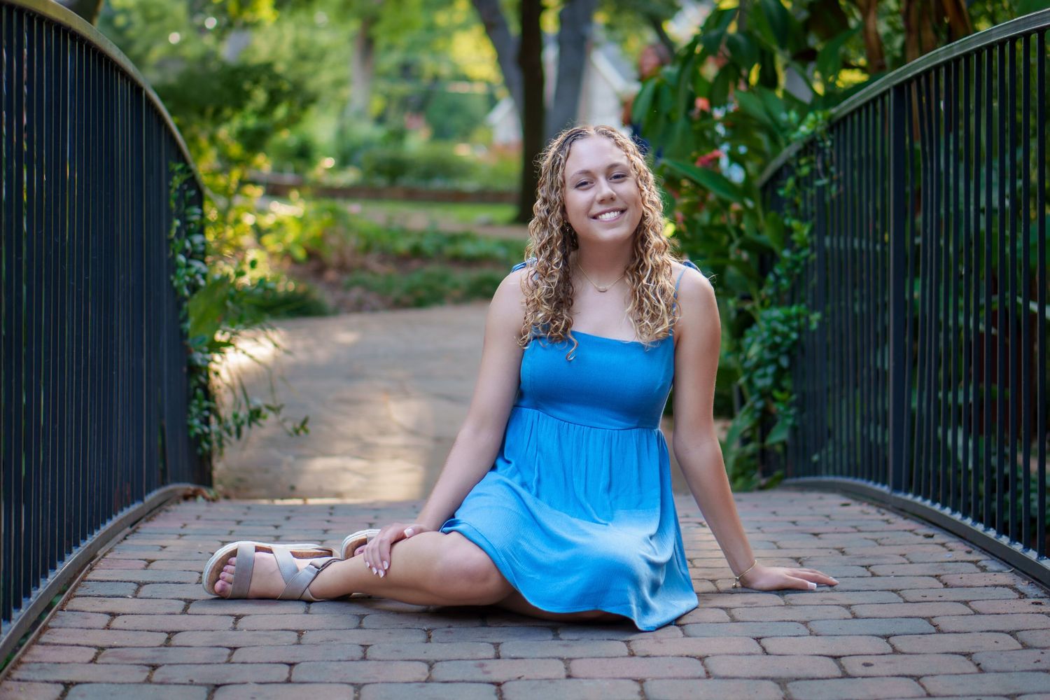 senior photo session Grapevine Botanical garden TX  blue dress on the bridge outfit  graduation