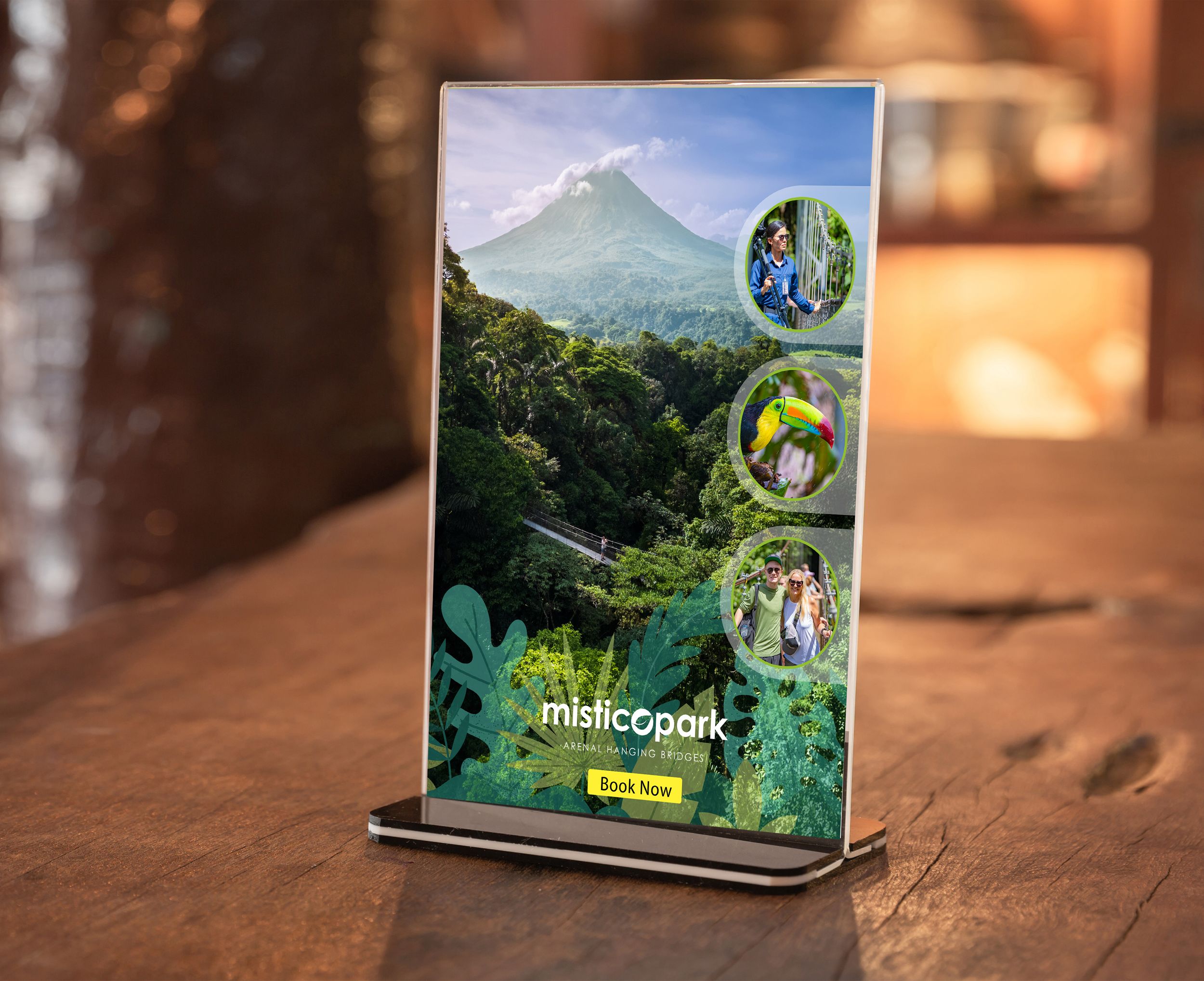 Promotional display stand showing mountain landscape with circular inset photos.