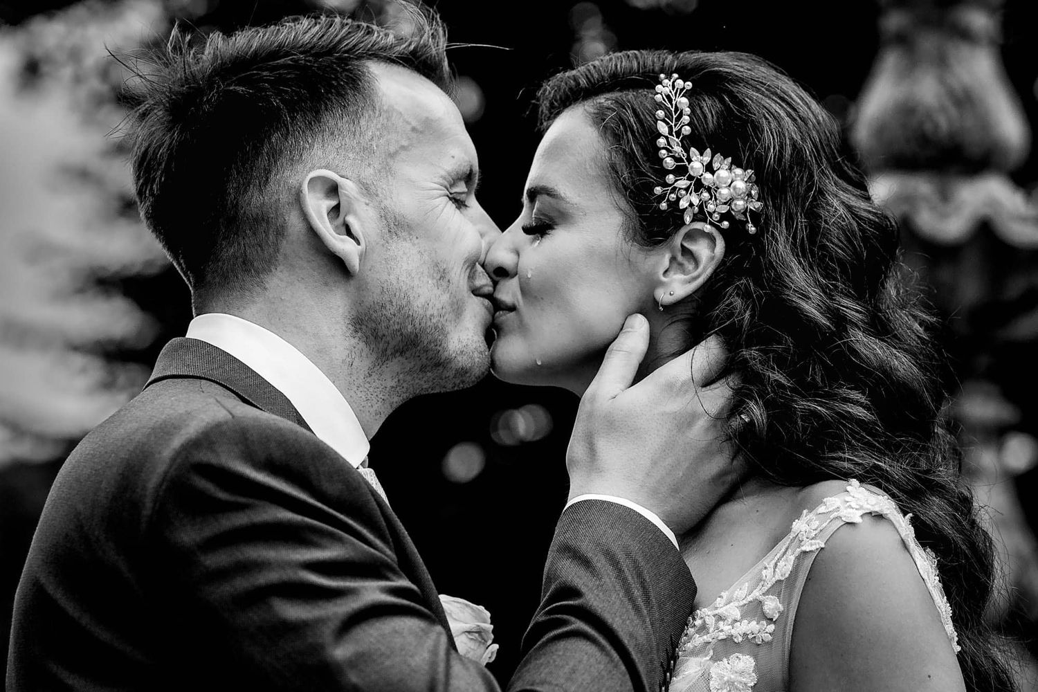 Bride and groom share an touching moment capture by photographer The Hague, Theo Manusaride.