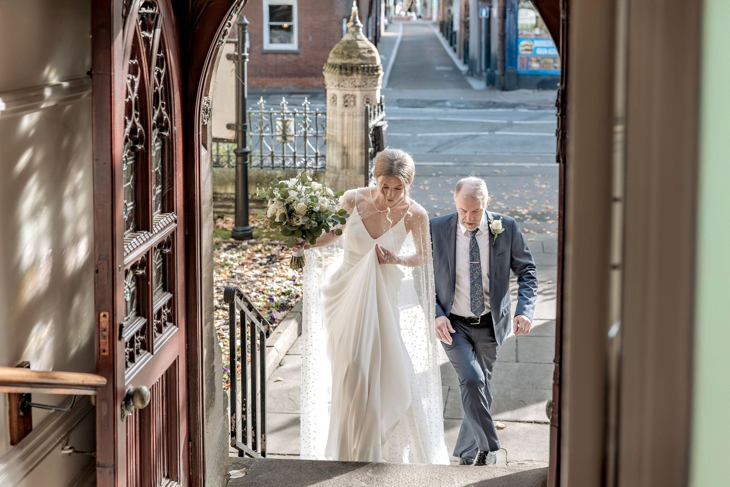 Unobtrusive wedding photographer at Gilstrap Registry Office, Newark.