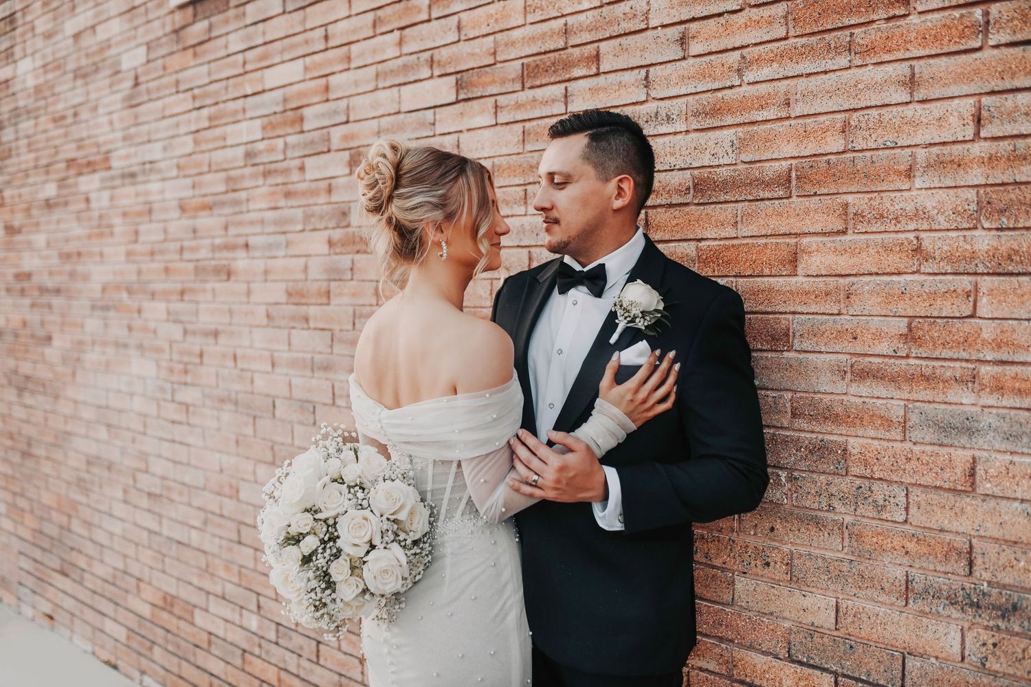 Editorial bride and groom portrait with modern architecture