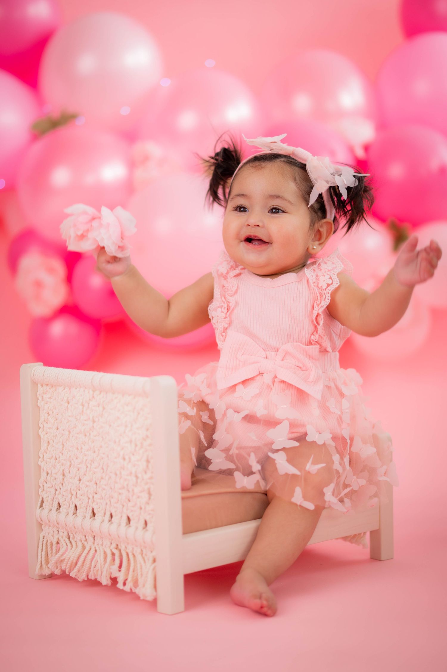Red letter blocks spell LOVE against black and white photo collage backdrop.