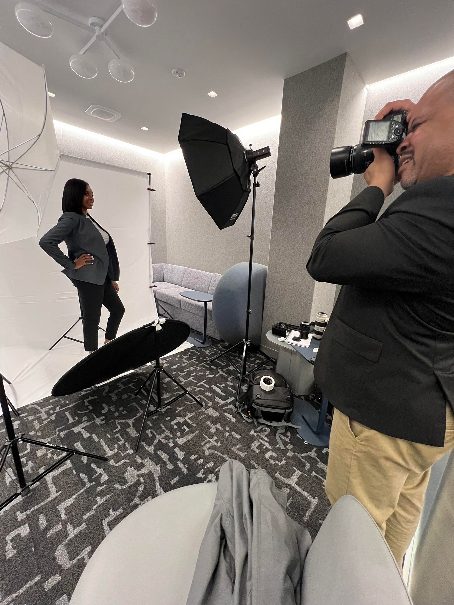 Headshot Photographer Kent Daniel photographing a corporate headshot