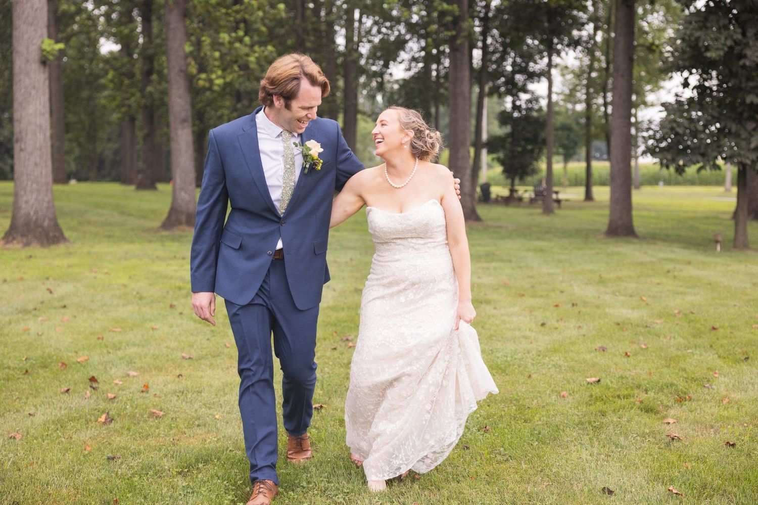 Bride and groom walking together during a relaxed Delaware wedding day timeline