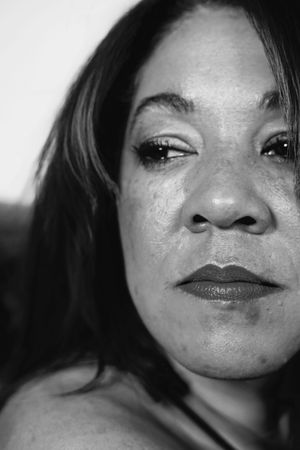 Series of black and white close-up portraits showing different facial expressions.