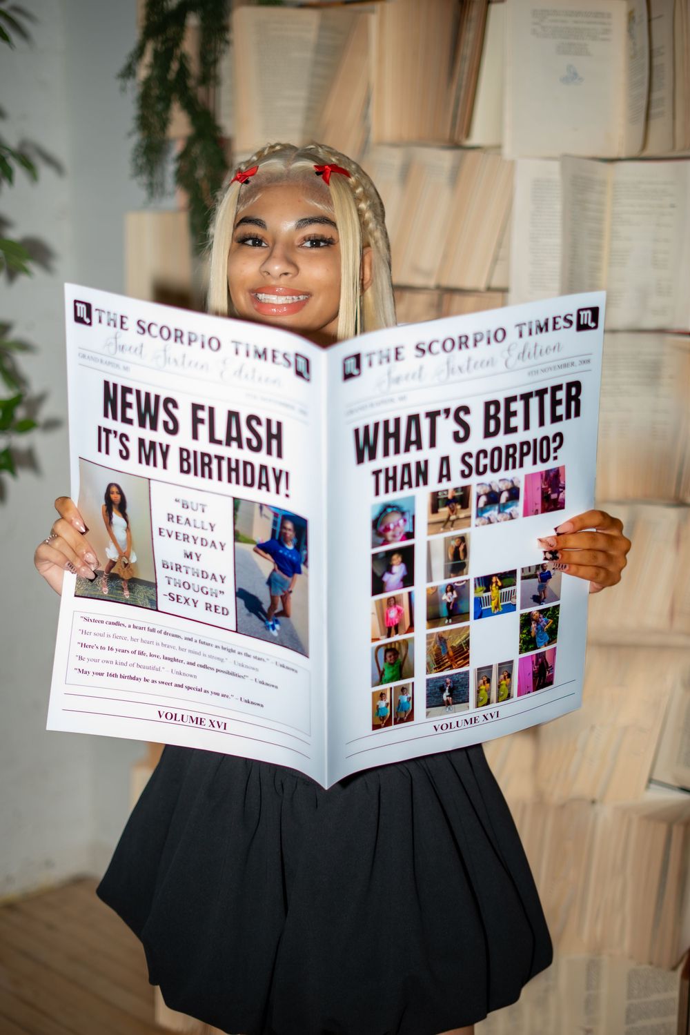 Custom newspaper-style birthday announcement being held up and displayed.