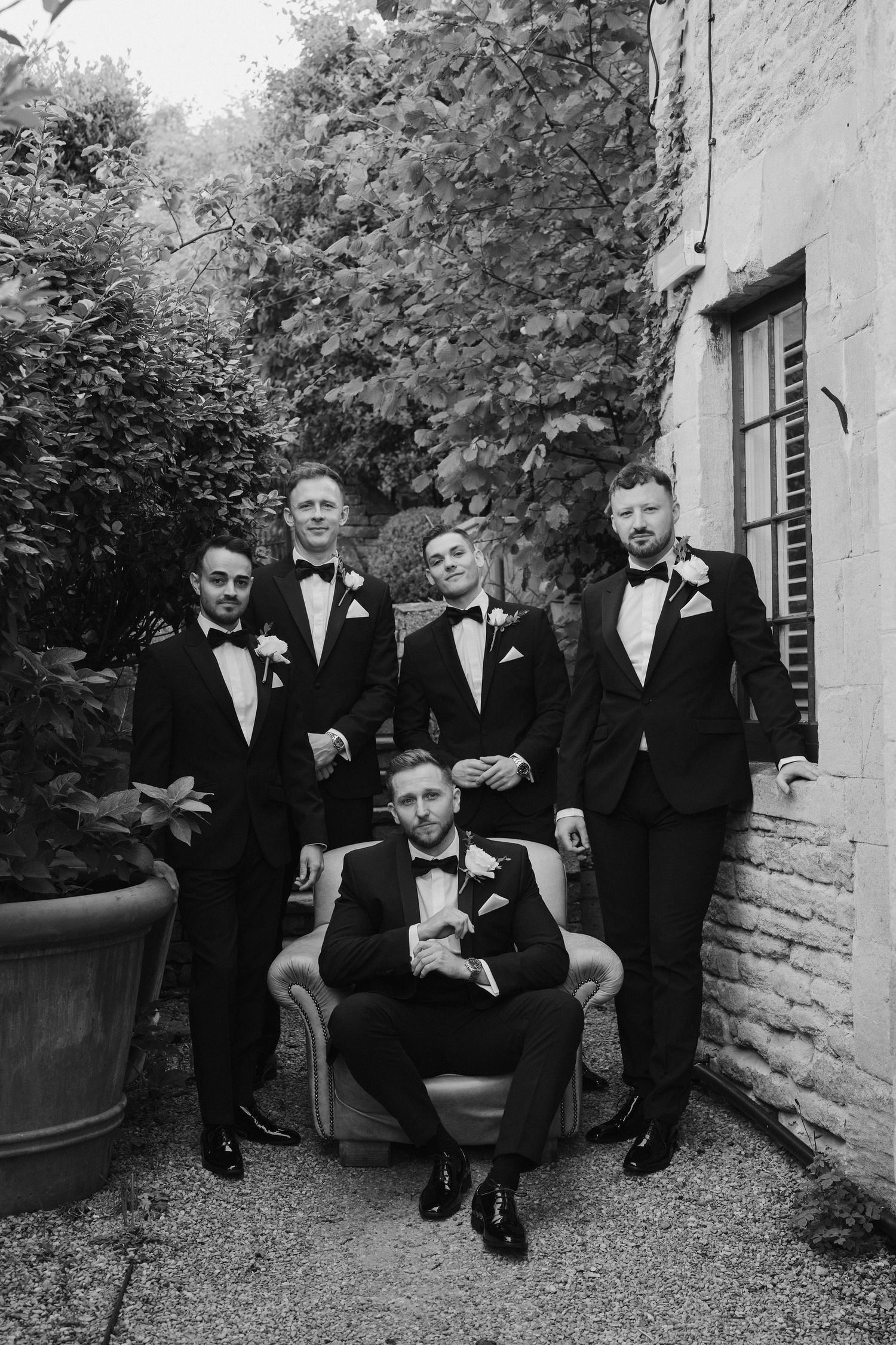 groom and groomsmen portrait at ivy lodge in cirencester