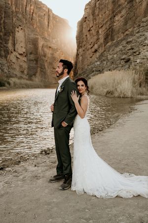 Wedding photos in a dramatic canyon setting during golden hour.