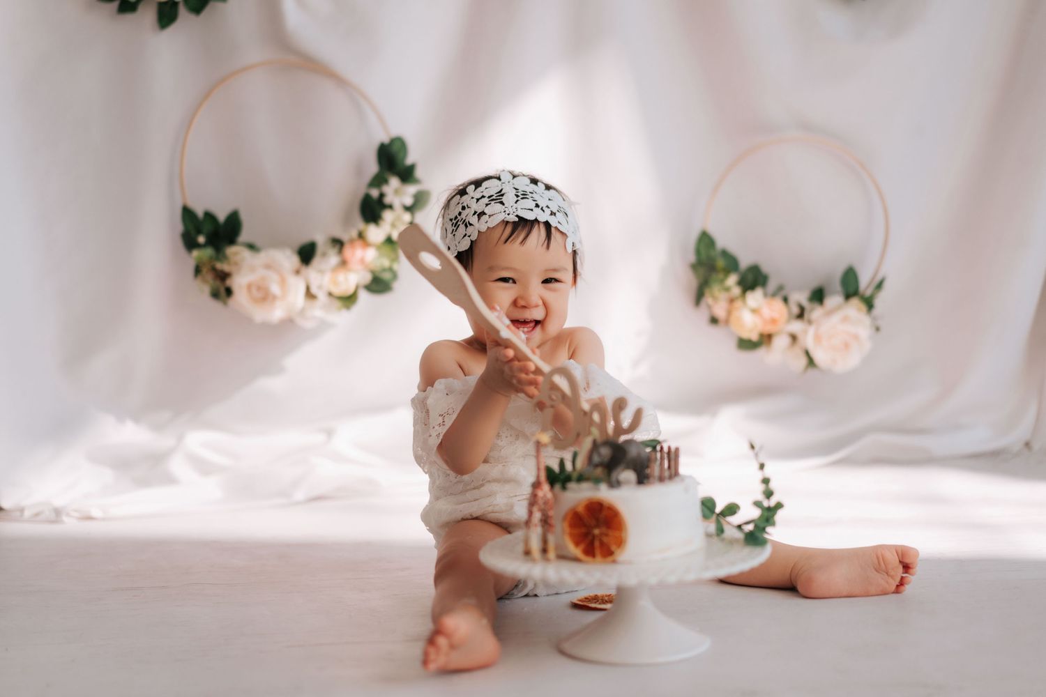 A series of artistic wedding photos showing feet, floral details, and white fabric in a romantic composition.