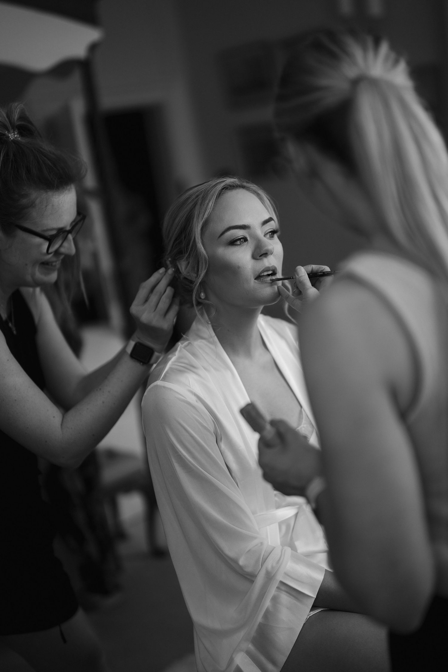 bride having lip liner applied at Iscoyd park
