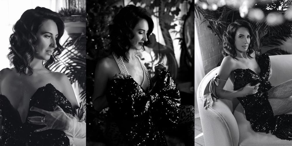 A romantic dance sequence captured in black and white with couples in elegant attire.
