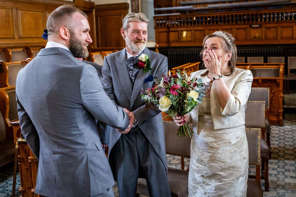 Dorothy wipes a tear as she becomes emotional during her intimate wedding ceremony with John at Southport Town Hall, surrounded by family