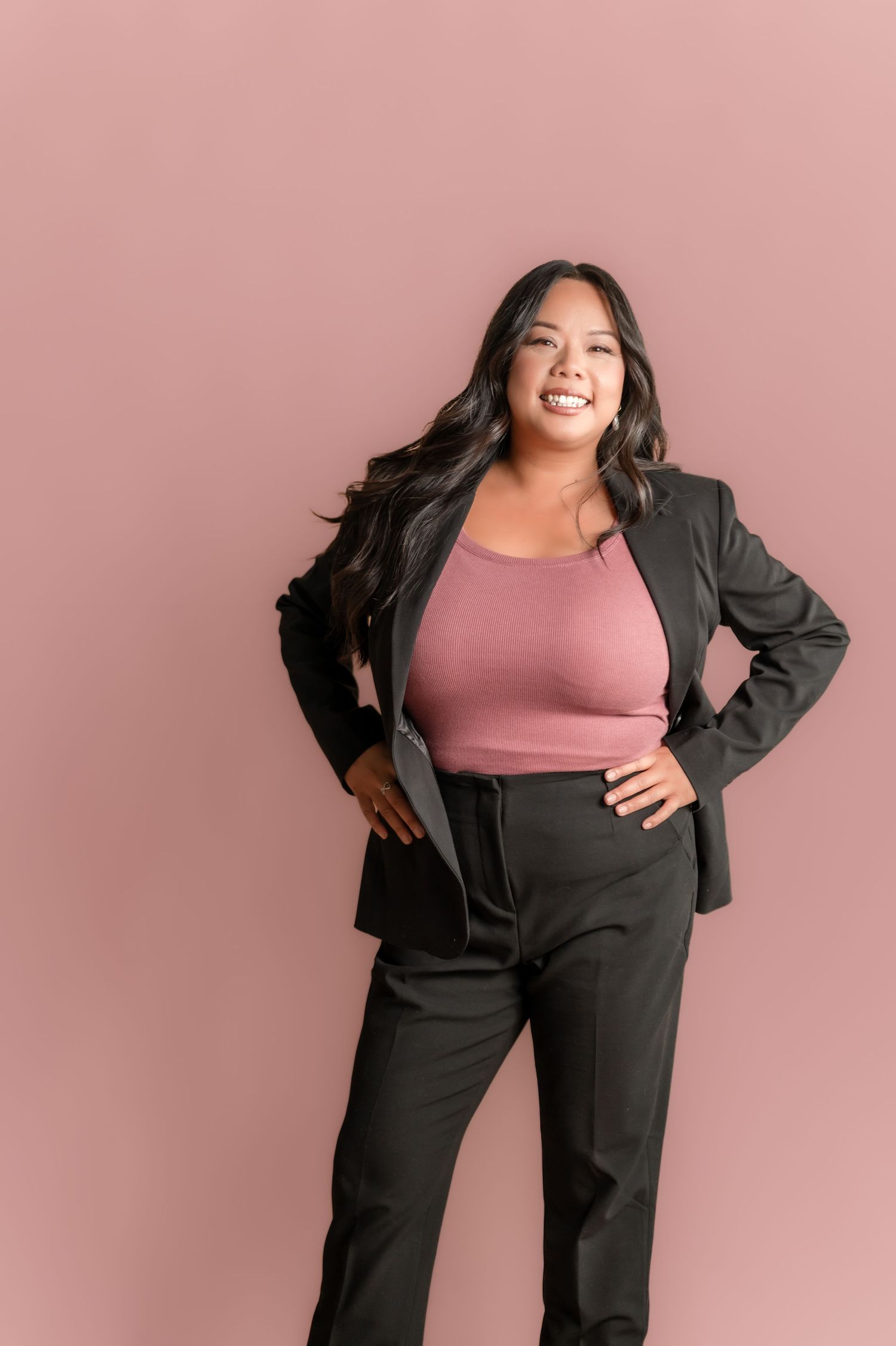Professional lifestyle photo series of someone in a black blazer posing on a white armchair in a modern interior setting.