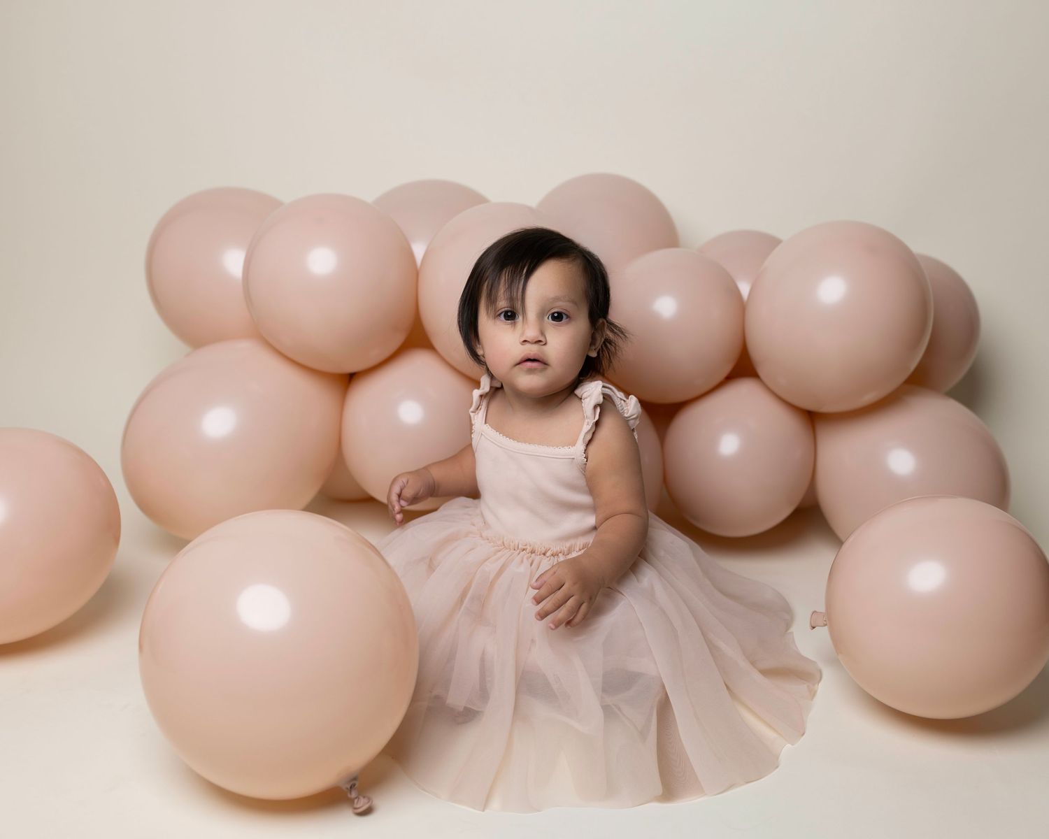 Neutral colors for baby girls first birthday.