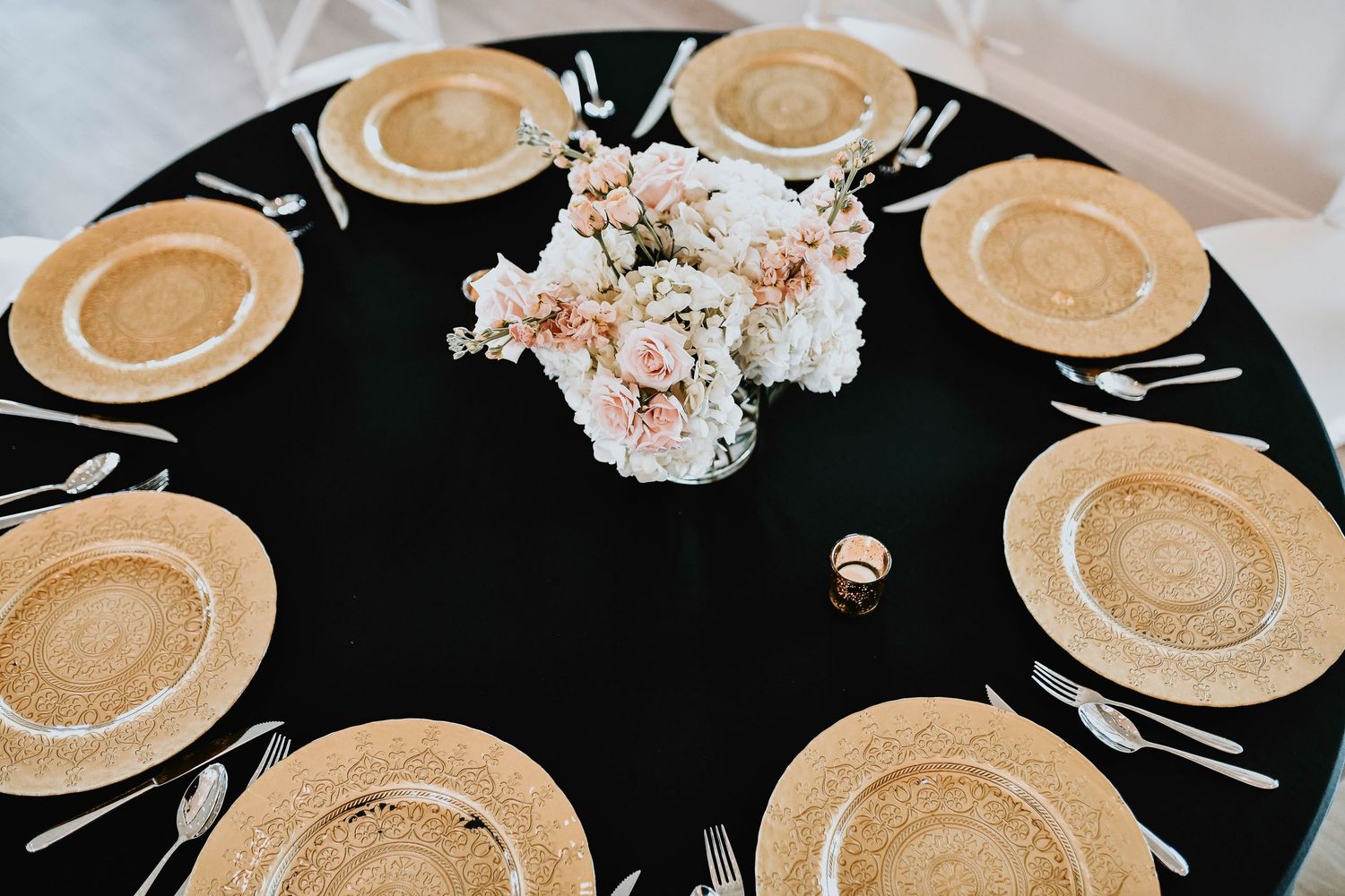 Spring wedding florals styled for vineyard celebration