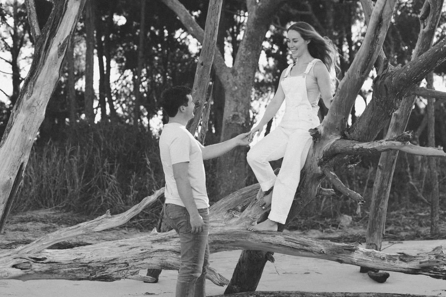 Brooke and Joseph having a cute moment at Morris Island Lighthouse