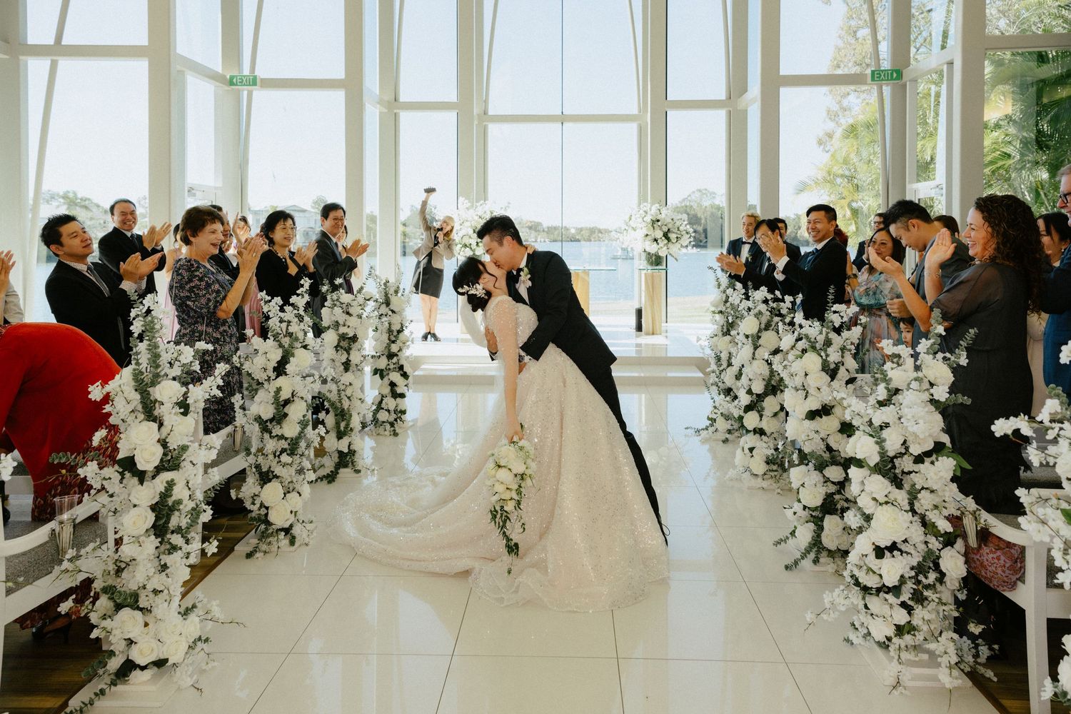 First kiss at InterContinental Sanctuary Cove, by top Brisbane wedding photographer"