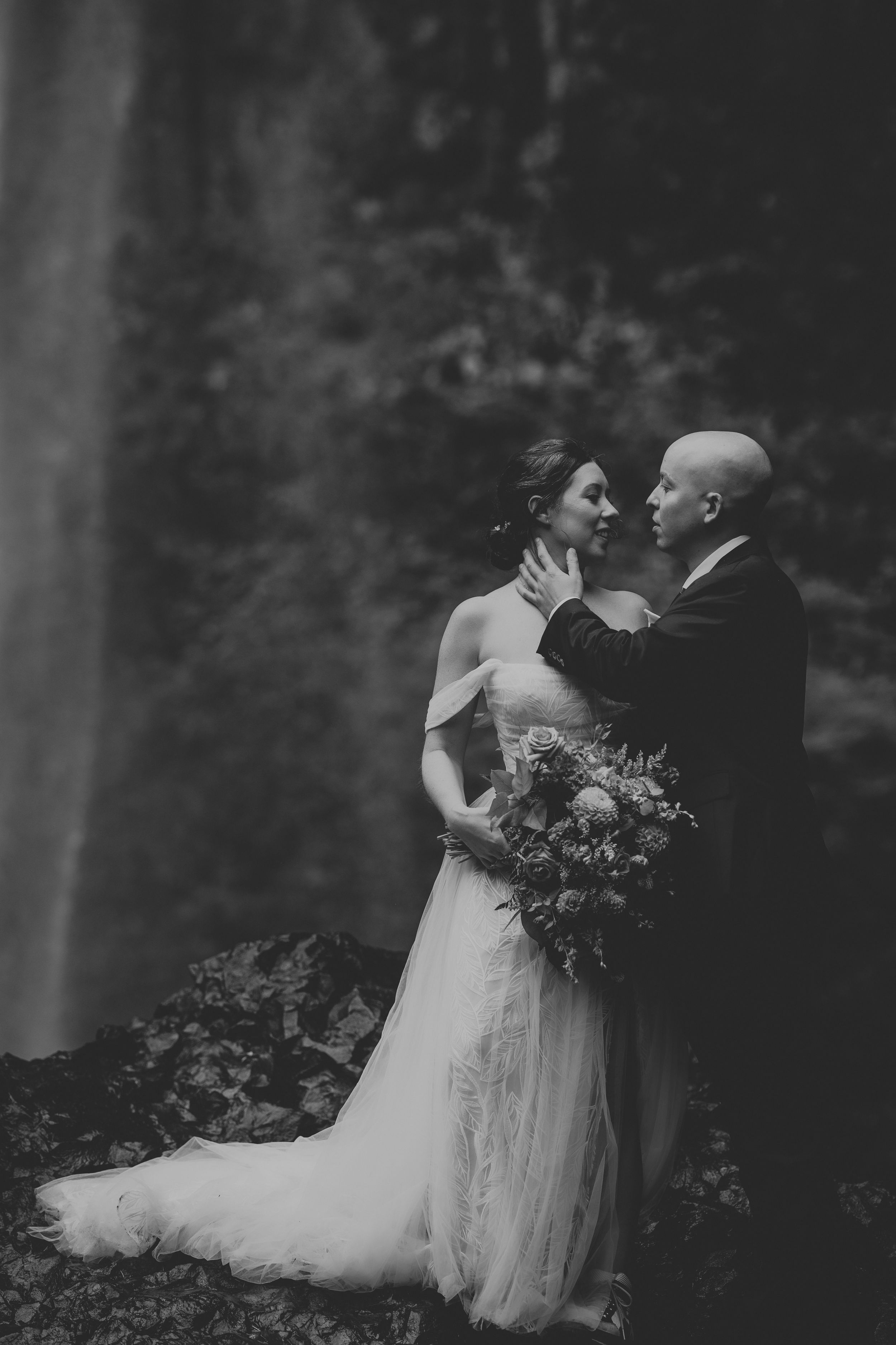 A romantic black and white wedding photo sequence shows a couple dancing together in a wooded outdoor setting.