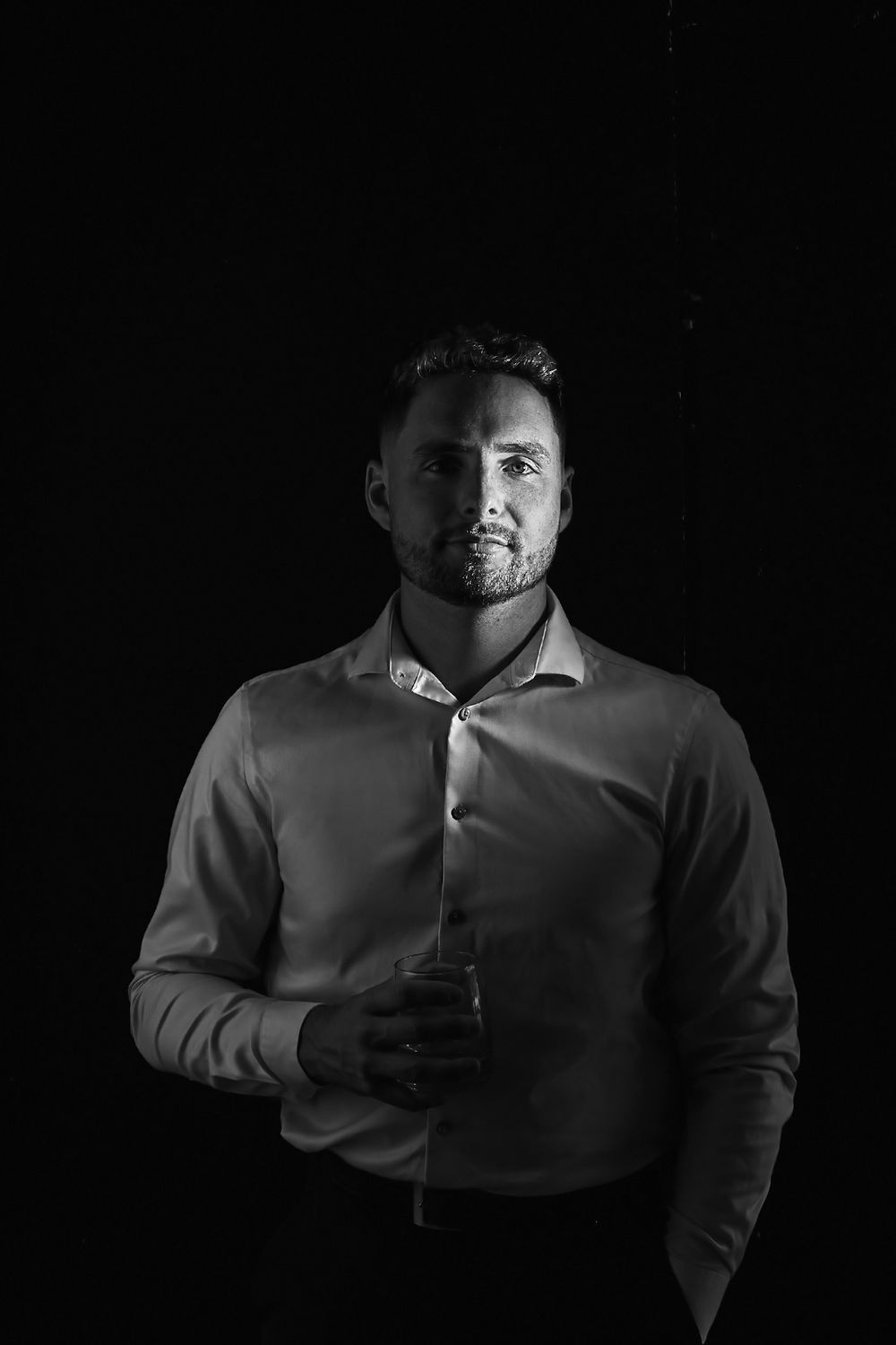 Dramatic low-key portrait series with dramatic lighting effects.