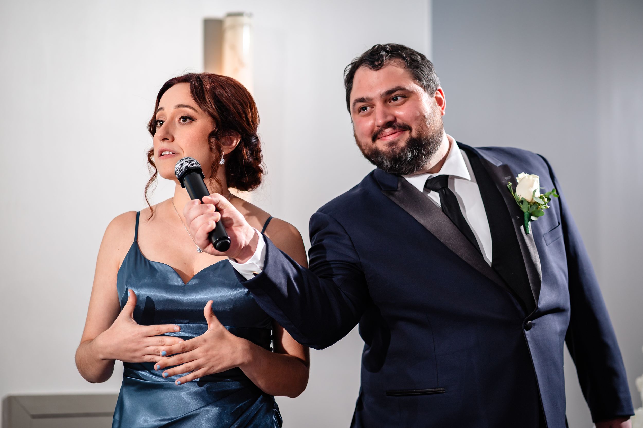 Elegant dance moves captured during formal wedding reception festivities.