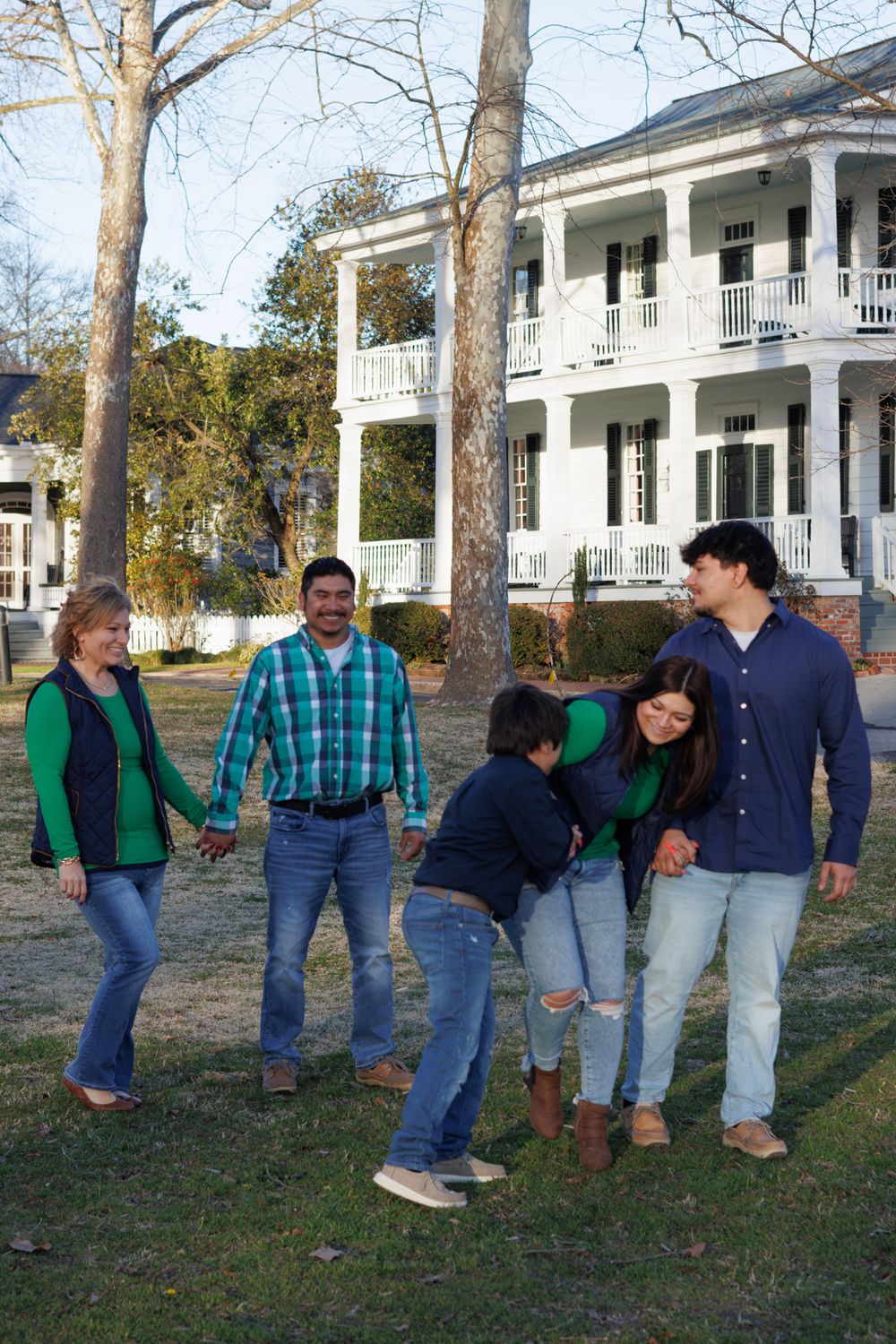 Candid family laughter captured on the steps of the Chowan Historic Courthouse
