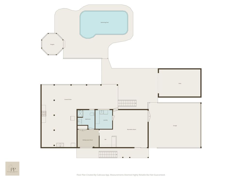 Architectural floor plan showing layout with bathrooms highlighted in blue and a swimming pool in the upper right corner.