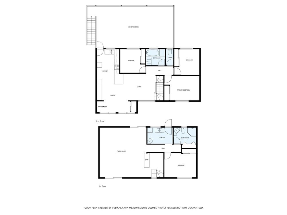 Black and white architectural floor plan showing two-story home layout with bedrooms, bathrooms and living spaces.
