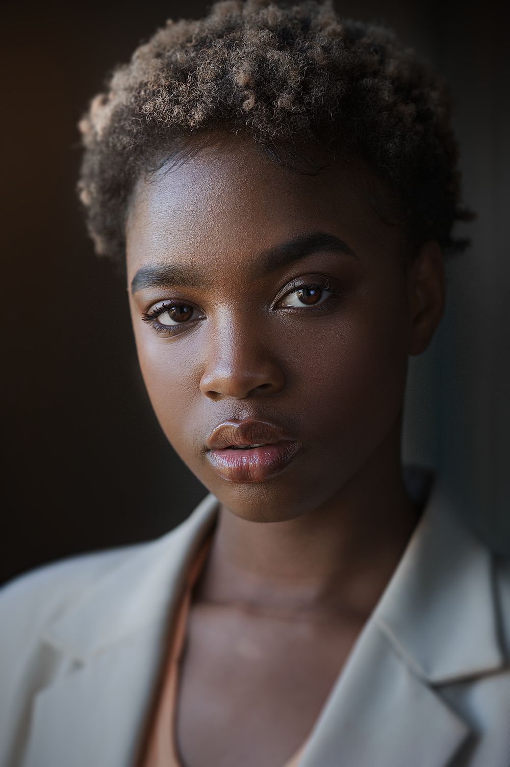 Modern portrait by Boyd Visuals. Subject's look is sharp, confident, and professional. Capturing business authority.