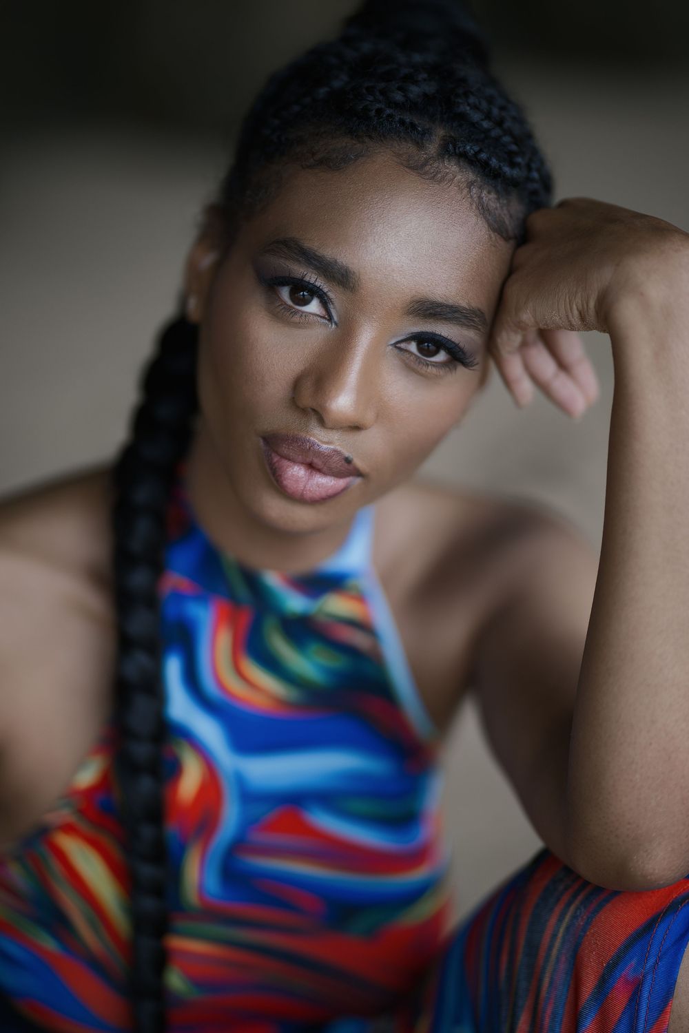 Expressive portrait by Boyd Visuals. Subject has an engaging, confident look. Bright colours, capturing dynamic passion.