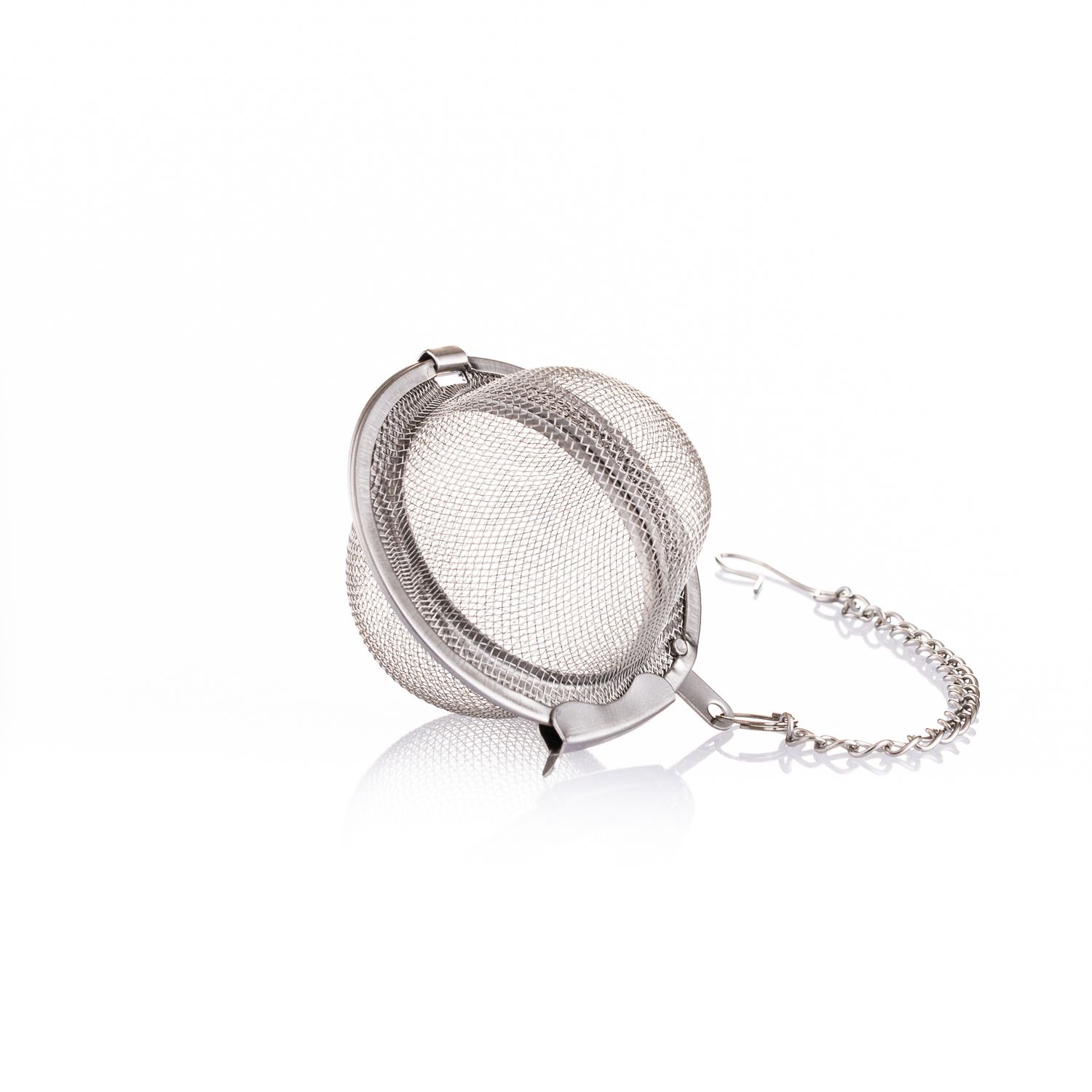 Stainless steel mesh tea ball infuser with chain, perfect for loose leaf tea brewing.