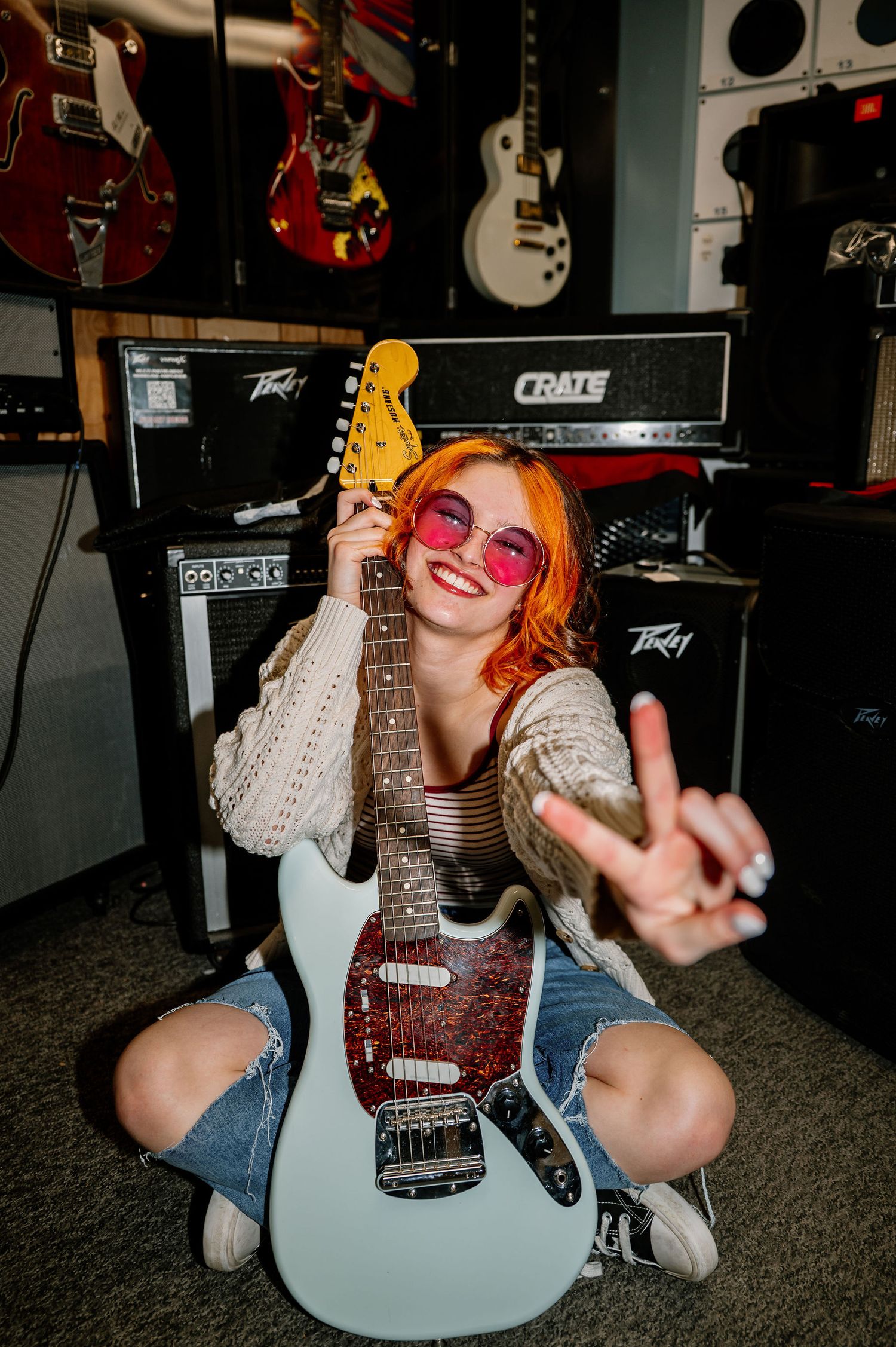 Fun senior photos with an electric guitar at Hot Poop in Walla Walla