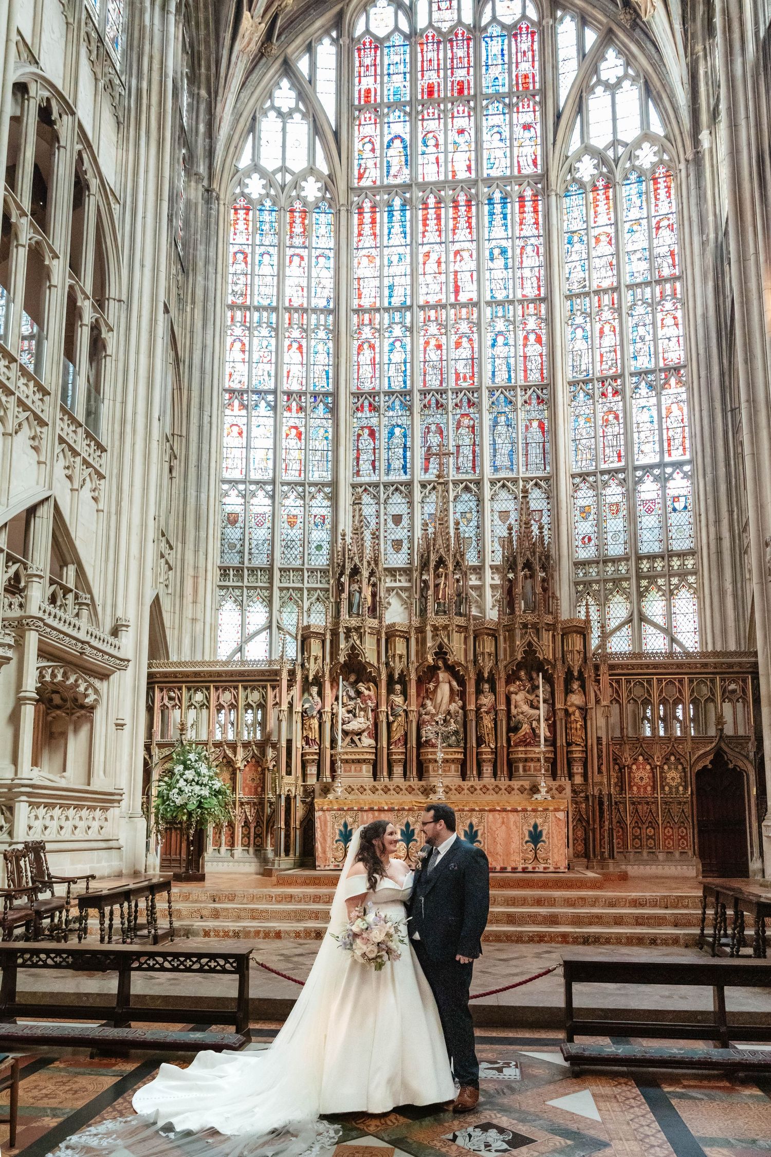 Gloucester Cathedral wedding photographer Gloucestershire Cheltenham Stroud bride and groom in the quire portrait