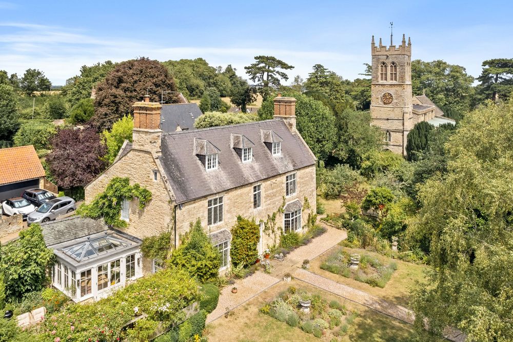 Drone image capturing the externals of a property for a real estate property listing.