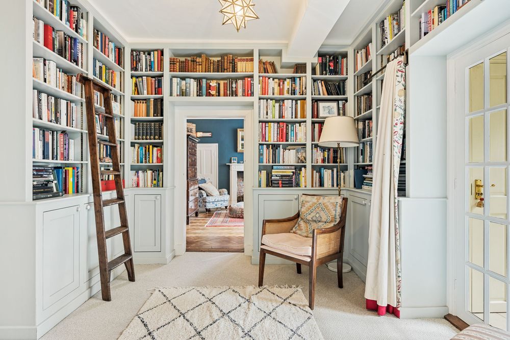 Interiors photography capturing a bookcase feature wall for a real estate property listing.