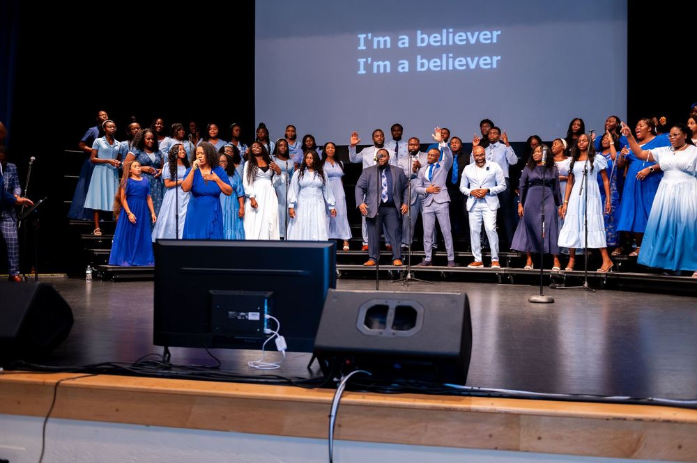 The South Florida Message Believers Choir sings at Palm Beach Gardens High School