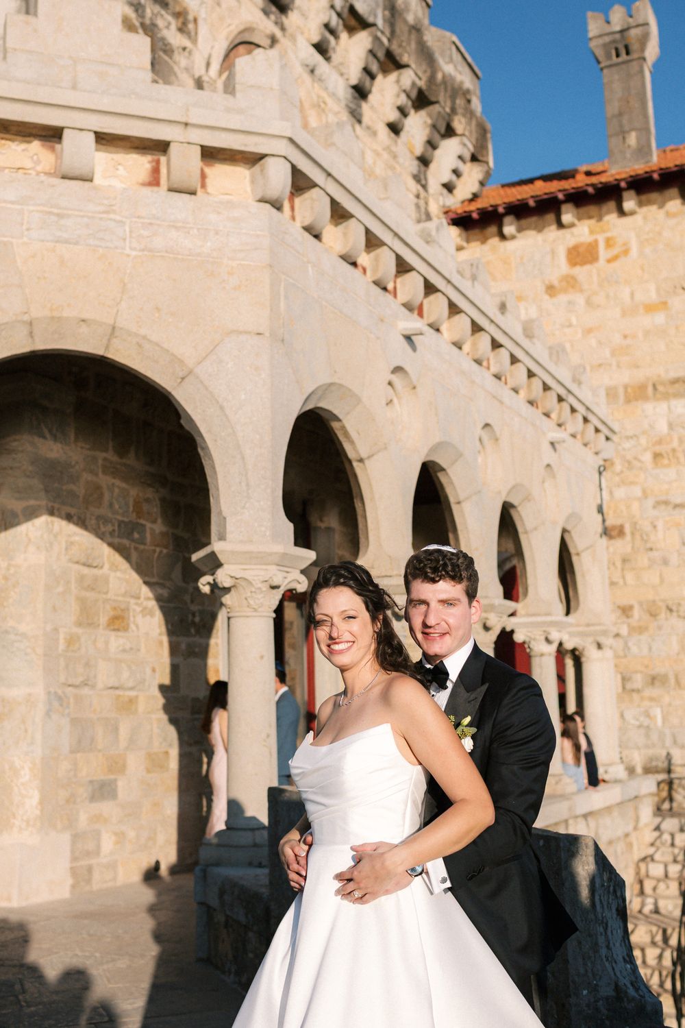Bride and groom portraits by Lisbon wedding photographer at seaside venue in Cascais Portugal