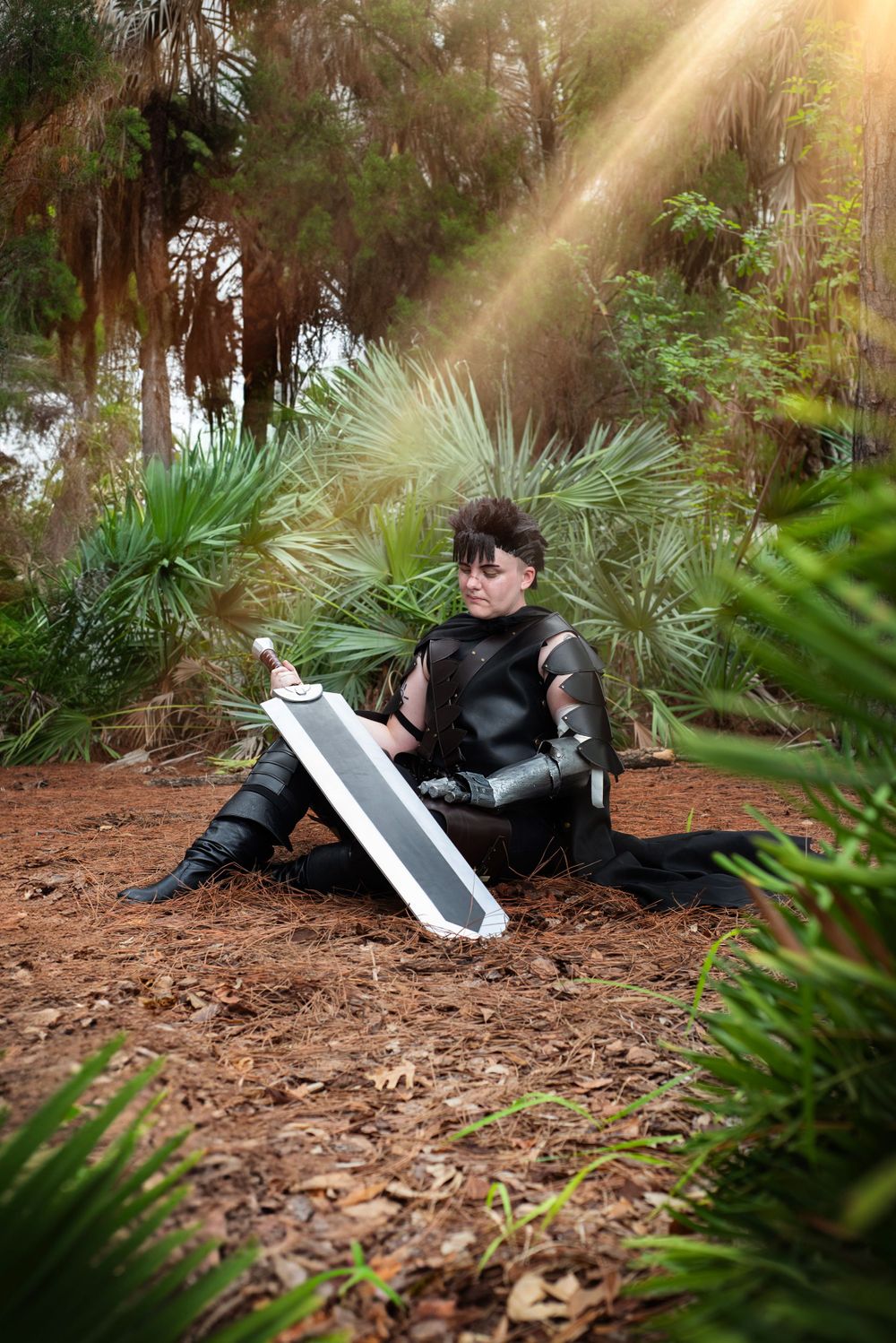 Solo masculine Cosplay session at Metrocon Tampa Florida photo of cosplayer in cinematic pose with sword prop