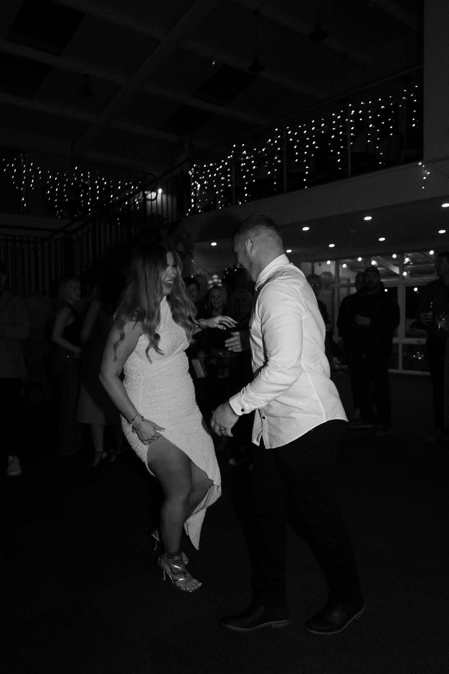 The Stable View Cafe and events owners dance at their 10 year wedding anniversary party celebration. Direct flash for editorial vibe