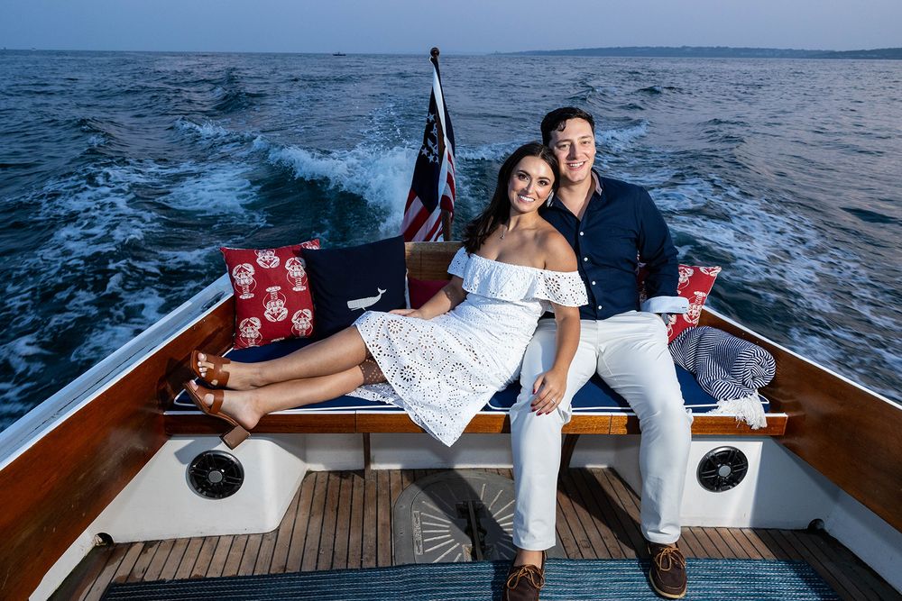 couple on boat, engaged, engagement photographer, engagement session, getting married, wedding plans, wedding ideas, couples posing ideas