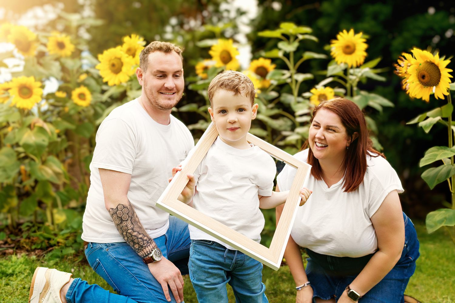 Parents with their child during family session in the park