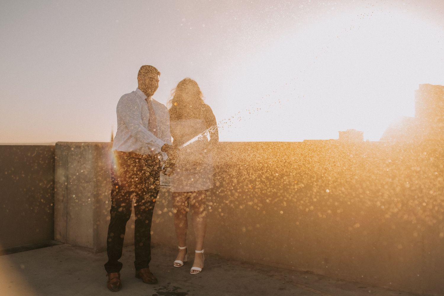 Albuquerque engagement photographer, engagement photos in albuquerque, rooftop engagement session, romantic and fun engagement session